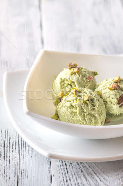 Pistachio ice cream in the bowl Stock photo © Alex9500