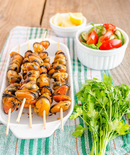 Mussel skewers with fresh salad Stock photo © Alex9500