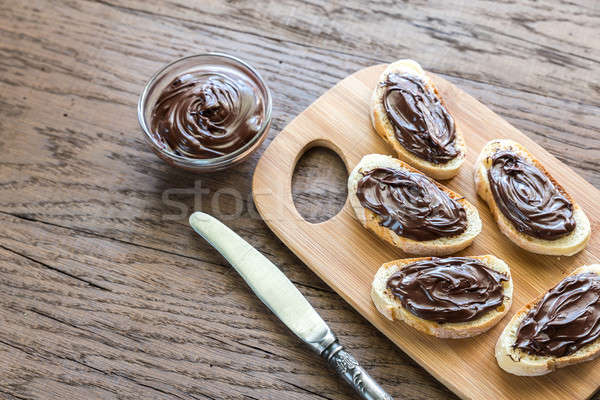 Slices of baguette with chocolate cream Stock photo © Alex9500