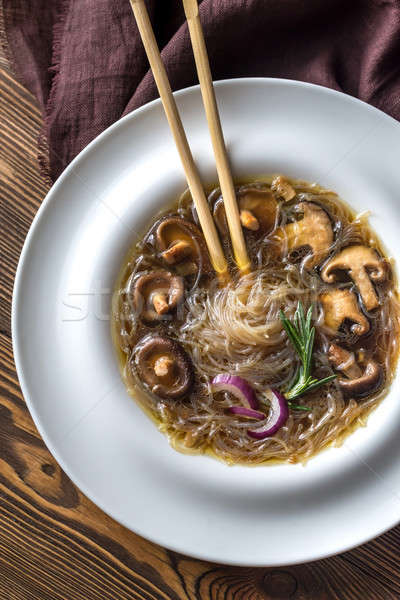 Stock photo: Portion of shiitake ginger soup on the wooden table