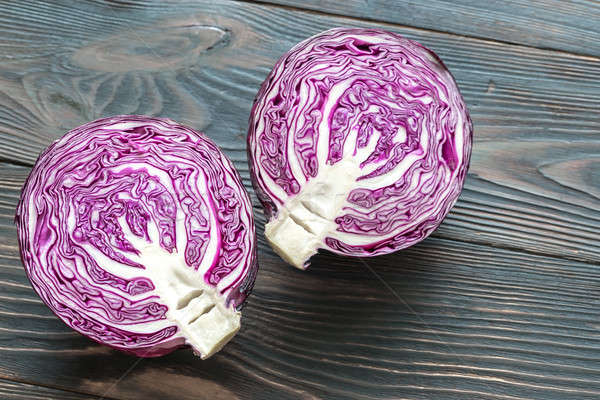 Halved red cabbage on the wooden background Stock photo © Alex9500