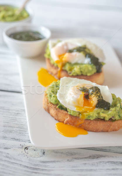 Sanduíches ovos fundo verde prato café da manhã Foto stock © Alex9500