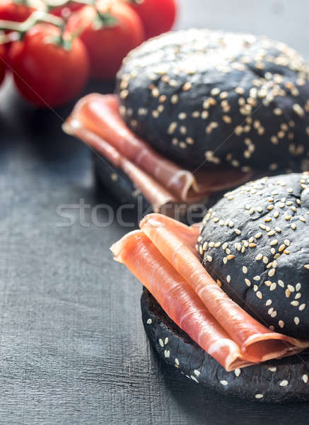 Black sandwich with prosciutto ham Stock photo © Alex9500