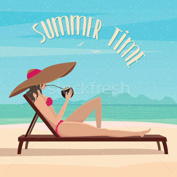 Girl lies on a beach near the sea Stock photo © alexanderandariadna