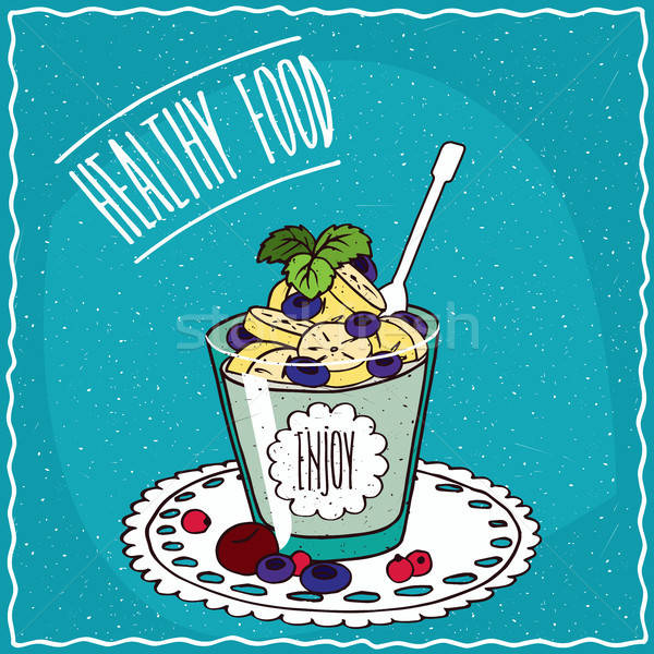 Natural yogurt with banana and blueberry Stock photo © alexanderandariadna