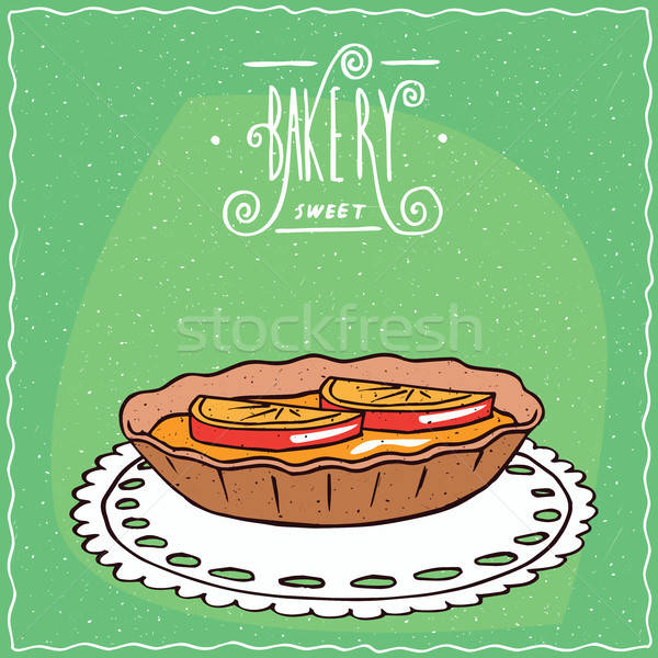 Tartlet with orange slices on lacy napkin Stock photo © alexanderandariadna