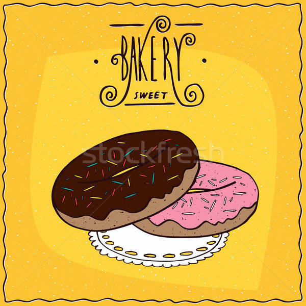 Donuts with chocolate frosting and pink glaze Stock photo © alexanderandariadna