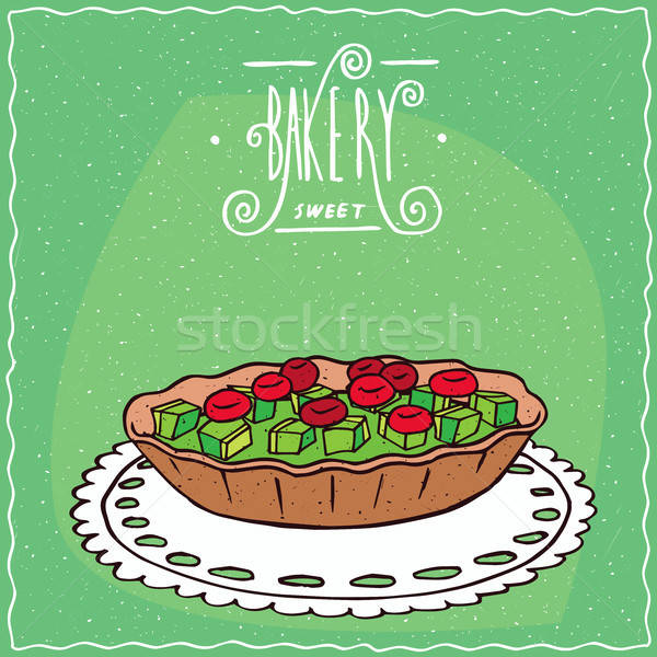 Tartlet with berries and kiwi on lacy napkin Stock photo © alexanderandariadna
