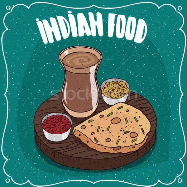Indian round flatbread with sauces and masala chai Stock photo © alexanderandariadna