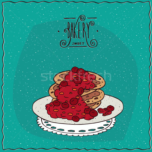 Pancakes with red berries on lacy napkin Stock photo © alexanderandariadna
