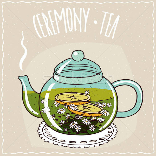 Glass teapot with chamomile tea Stock photo © alexanderandariadna
