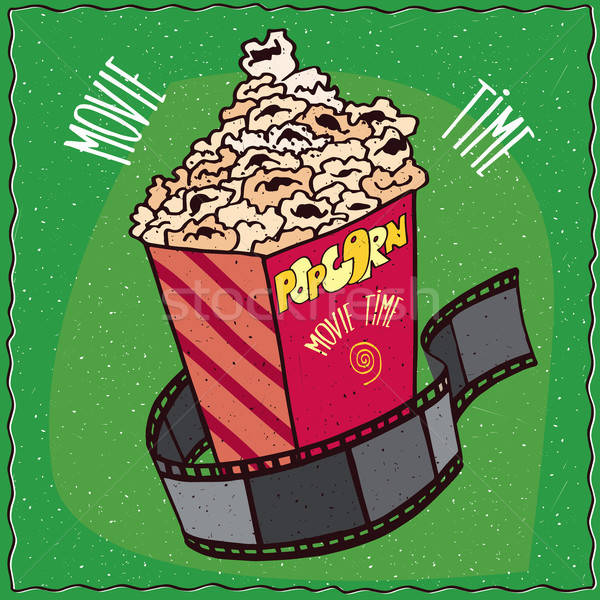 Karton Popcorn Reel Film hellen Heap Stock foto © alexanderandariadna