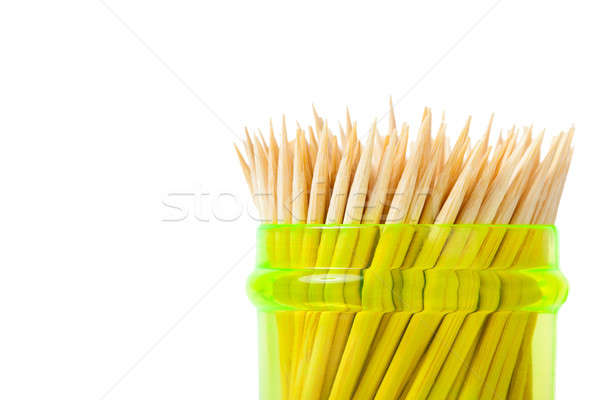 Stock photo: Toothpick in green container isolated on white