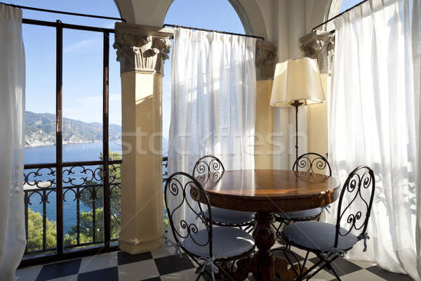 Elegant diningroom with speechless view on the coast Stock photo © alexandre_zveiger