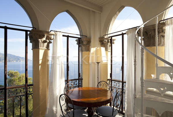 Elegant diningroom with speechless view on the coast Stock photo © alexandre_zveiger