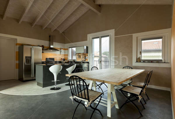 interior, new loft furnished, view of dining table and kitchen Stock photo © alexandre_zveiger