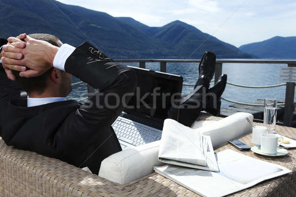 Imprenditore rilassante uno relax lago business Foto d'archivio © alexandre_zveiger