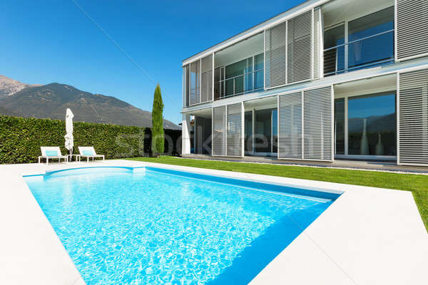 Moderna Villa piscina vista árbol azul Foto stock © alexandre_zveiger