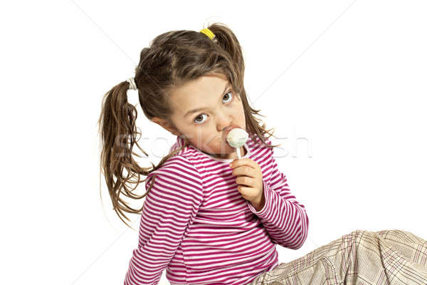 Bambina bianco primo piano adorabile lollipop isolato Foto d'archivio © alexandre_zveiger