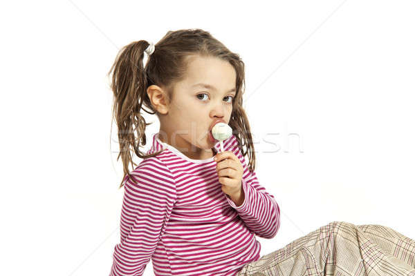Bambina bianco primo piano lollipop isolato mano Foto d'archivio © alexandre_zveiger