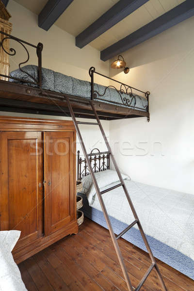 Bedroom interior and wrought iron stairs Stock photo © alexandre_zveiger