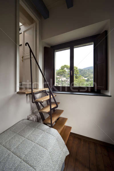 Bedroom interior and wooden stairs Stock photo © alexandre_zveiger