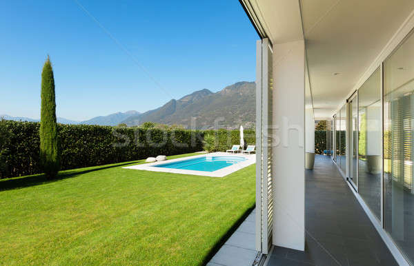 Moderno villa piscina view estate verde Foto d'archivio © alexandre_zveiger