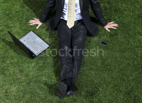 Empresário relaxante um trabalhar gramado computador Foto stock © alexandre_zveiger