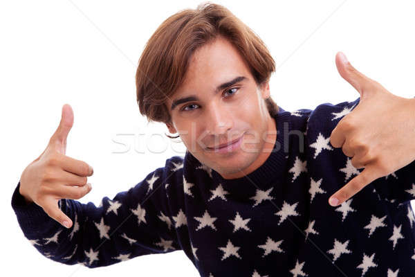 young man with his hands rise up as a sign of everything cool Stock photo © alexandrenunes