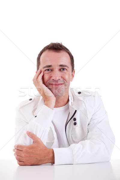 smiling middle-age man sitting at desk  Stock photo © alexandrenunes