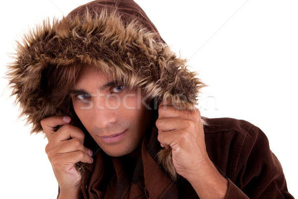 Portrait of a young man with a furry hood , in autumn/winter clothes Stock photo © alexandrenunes