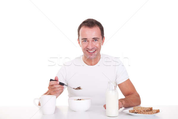 Bell'uomo colazione isolato bianco Foto d'archivio © alexandrenunes