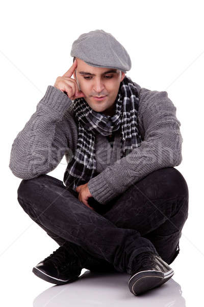 Porträt junger Mann Sitzung Stock Denken Blick nach unten Stock foto © alexandrenunes