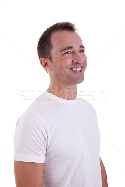 Portrait of a handsome middle-age man smiling, on white background. Studio shot Stock photo © alexandrenunes