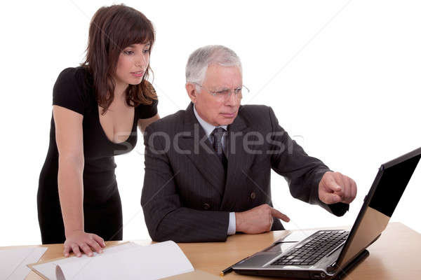 бизнесмен женщину работу указывая компьютер Сток-фото © alexandrenunes