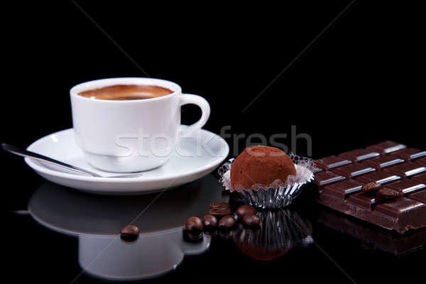 Coffee with chocolate - brigadier, on black with reflexion Stock photo © alexandrenunes