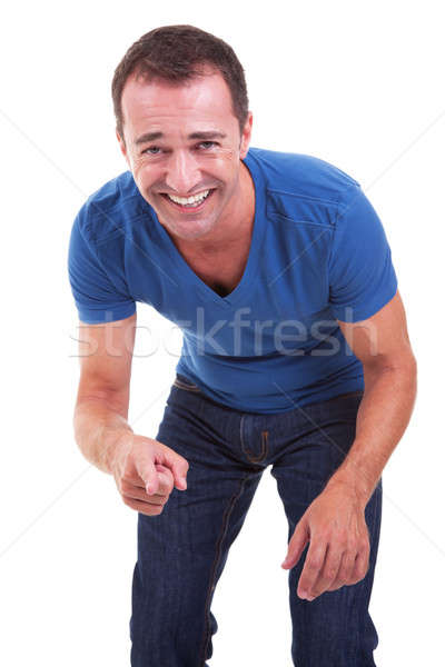 Portrait of a handsome middle-age man, pointing and laughing, very happy, Stock photo © alexandrenunes