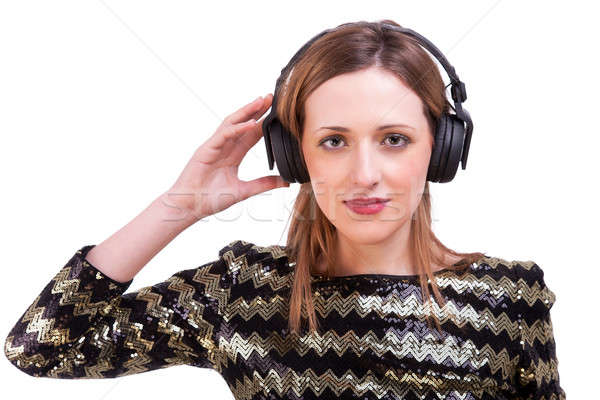 beautiful woman standing listening to music on black headphones Stock photo © alexandrenunes