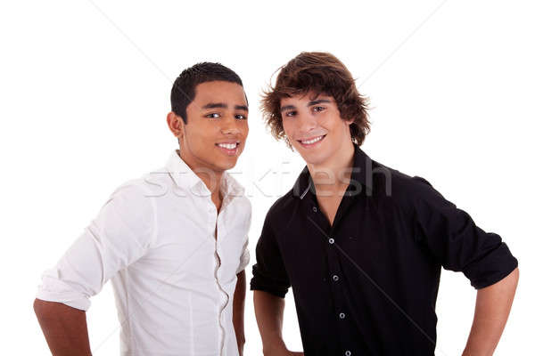 friends: two young man of different colors,looking to camera and smiling Stock photo © alexandrenunes