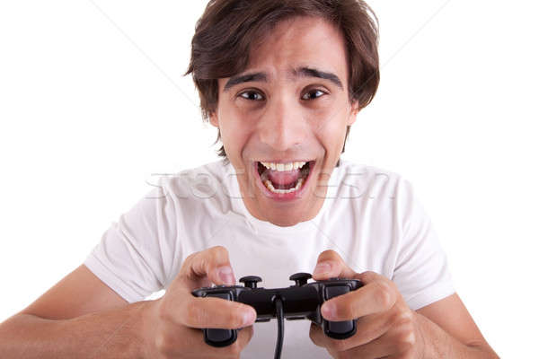 Foto stock: Hombre · guapo · jugando · gamepad · aislado · blanco