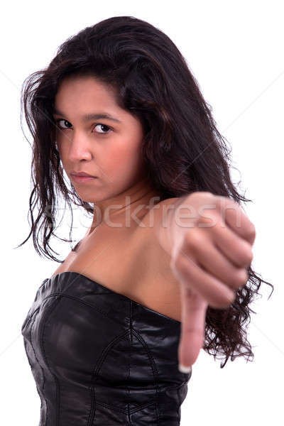 beautiful and serious young woman, with tumb down Stock photo © alexandrenunes