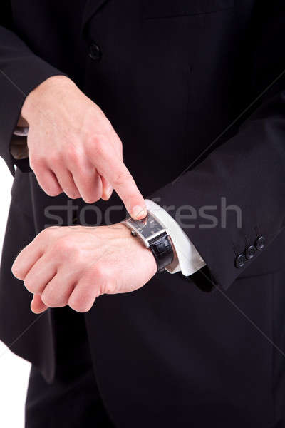 Stock photo: businessman pointing to the watch