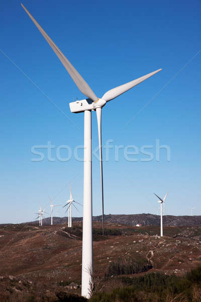 mountain with windmills power, on blue sky; Stock photo © alexandrenunes