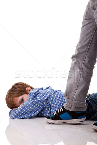 an older boy crushing the glasses to a younger boy Stock photo © alexandrenunes