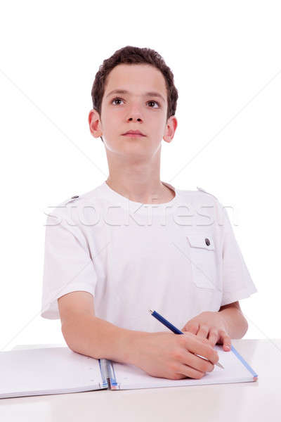 cute boy on the desk studying and thinking Stock photo © alexandrenunes
