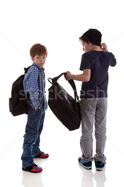 two students seen with his back to the school bags, one looking back Stock photo © alexandrenunes