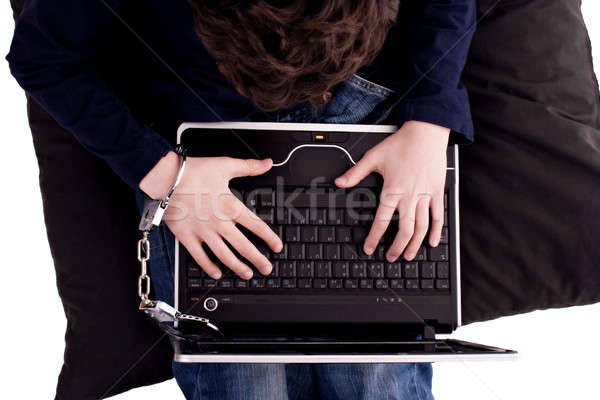 young man chained to the computer Stock photo © alexandrenunes