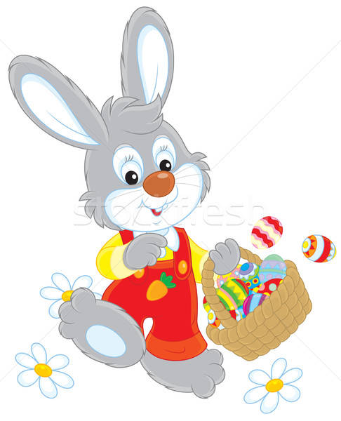 Easter Bunny with a basket of eggs Stock photo © AlexBannykh