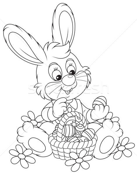 Easter Bunny with a basket of eggs Stock photo © AlexBannykh