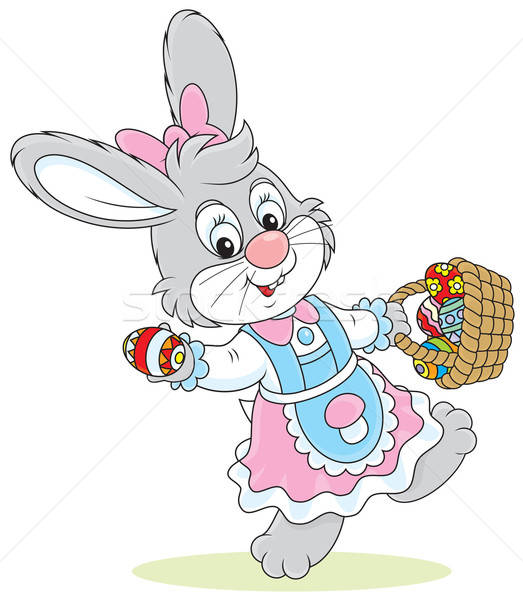 Easter Bunny with a basket of eggs Stock photo © AlexBannykh